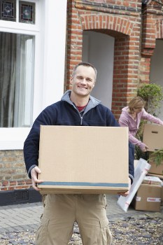 Removal van and moving boxes for a house move in Queens Park