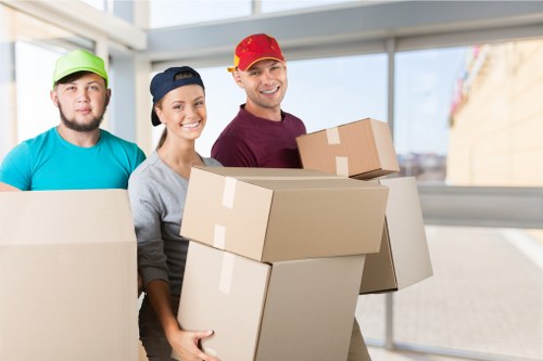 Queens Park moving service handling boxes and household items