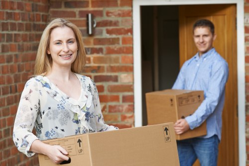 Professional removals team planning a move in Queens Park