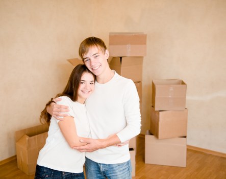Professional movers handling same day removals in Queens Park on a residential street