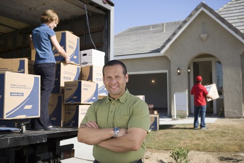 Customer reviewing payment and booking details for a removals service