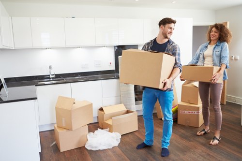 Local removal team loading furniture for an urgent move in Queens Park
