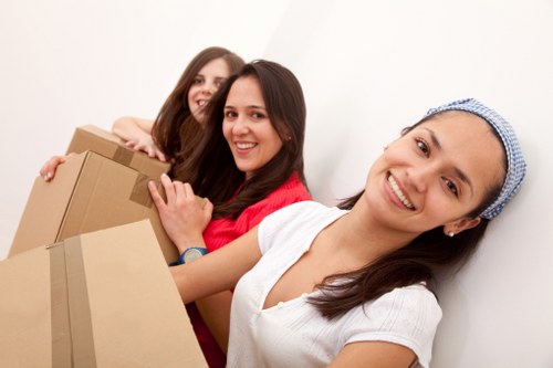 Packing boxes and moving supplies arranged for a Queens Park home move