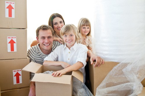 Boxes and packed essentials prepared for a student move in Queens Park