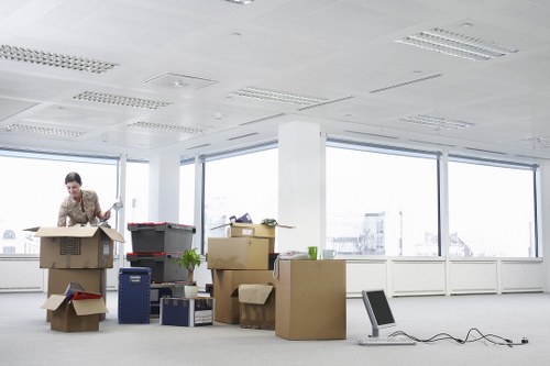 Team preparing furniture and IT equipment for an office relocation
