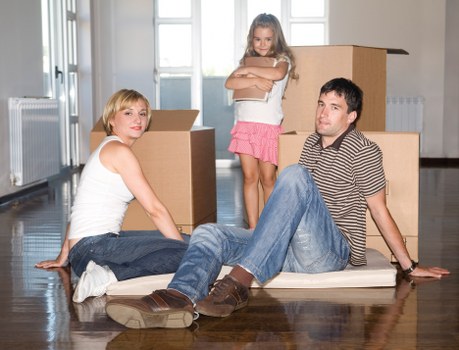 Furniture being moved through a typical Queens Park flat building access area